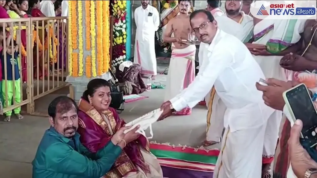 Minister Roja with her husband Visits Venkatapalem Venkateshwaraswamy Temple in Guntur 