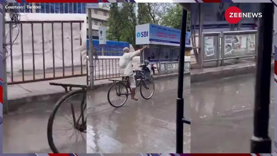 viral video of old man performing stunt on road from bicycle see shocking video 