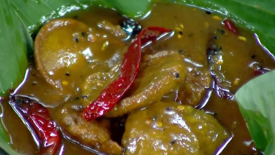 Recipe of sour and spicy Ilish dimer ombol in Bengali 