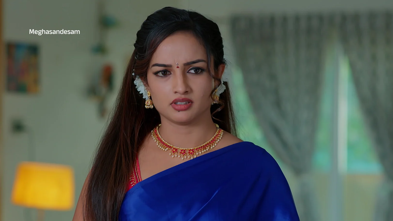 Bhoomi Disguises as a Police Officer - Meghasandesam - Promo