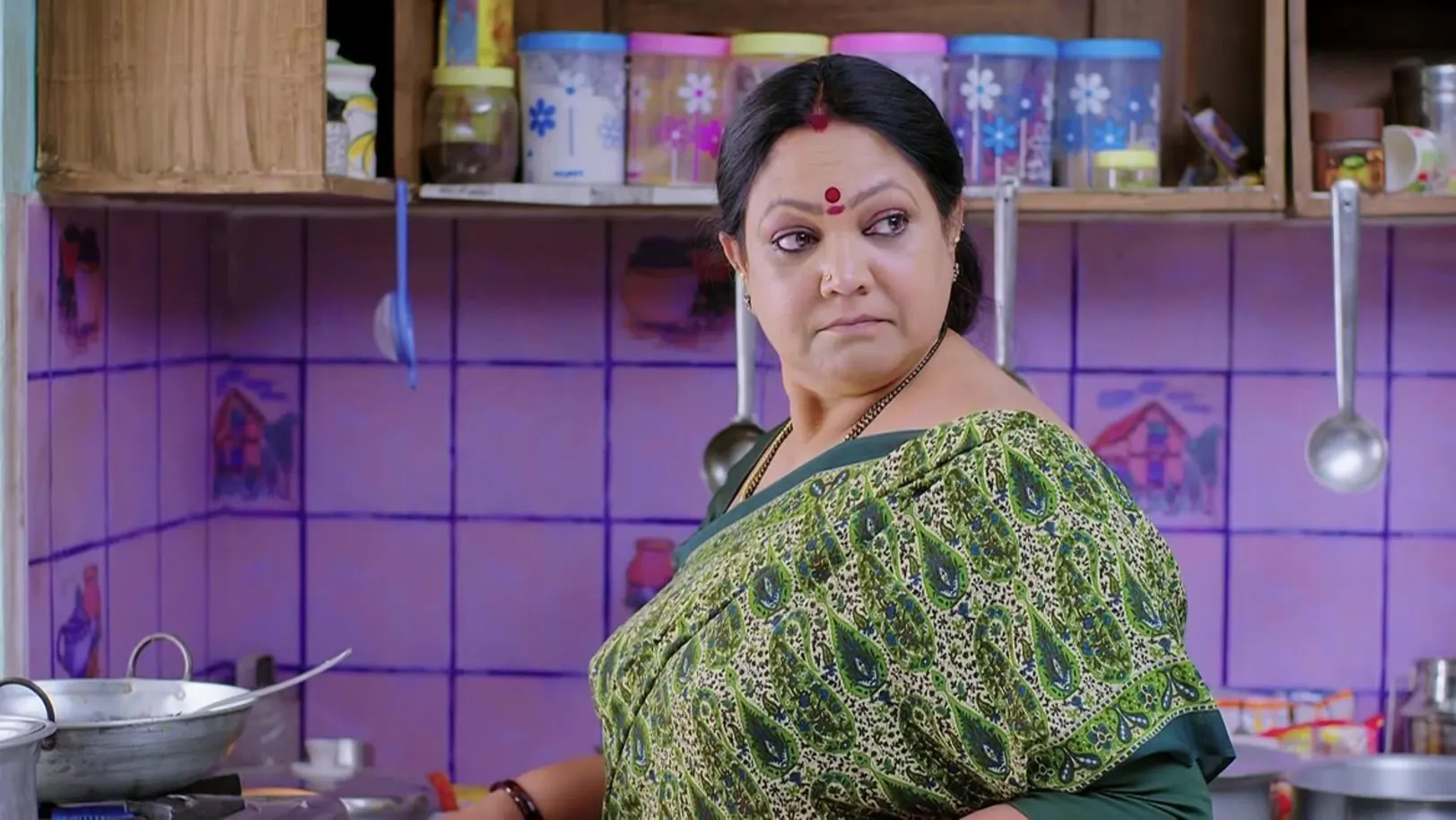 Anu wears a new dress to go to office 