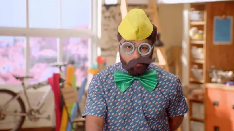 Uncle with a big moustache, artificial pastry and paper cup animals