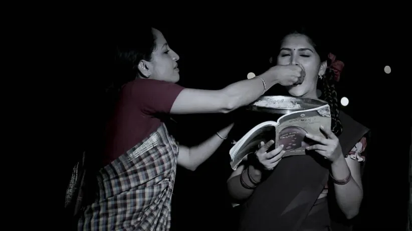 Kamali's mother feeds her daughter Kamali - Kamali