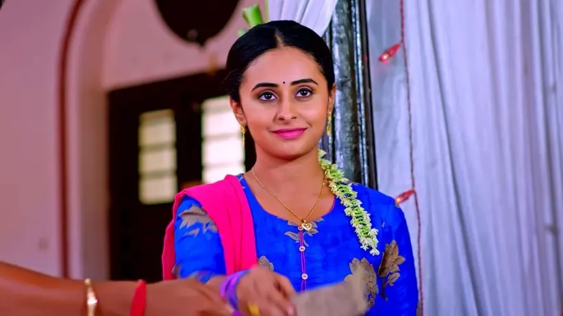 Kanthi and Sneha Distribute the Prasad