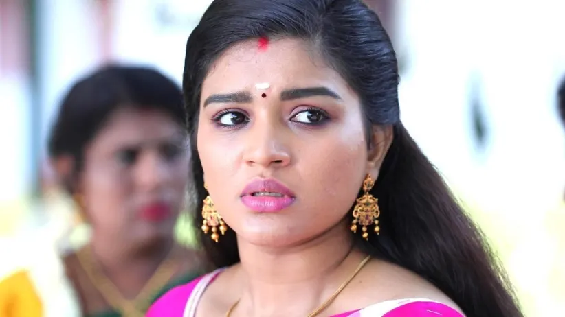 Akhila Gives the Ancestral Sword to Parvathy