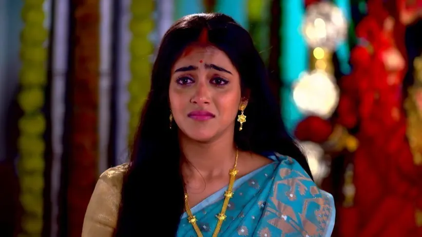 Gouri Makes 'Pithe' for the Goddess