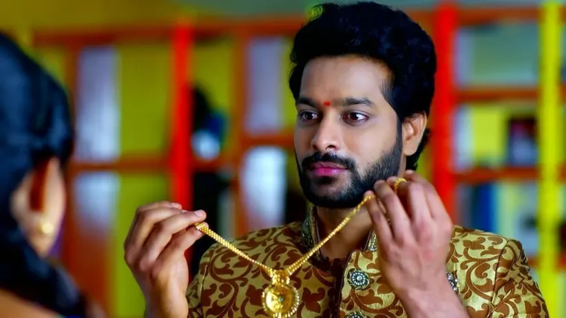 Prudhvi Puts a Necklace on for Punnami