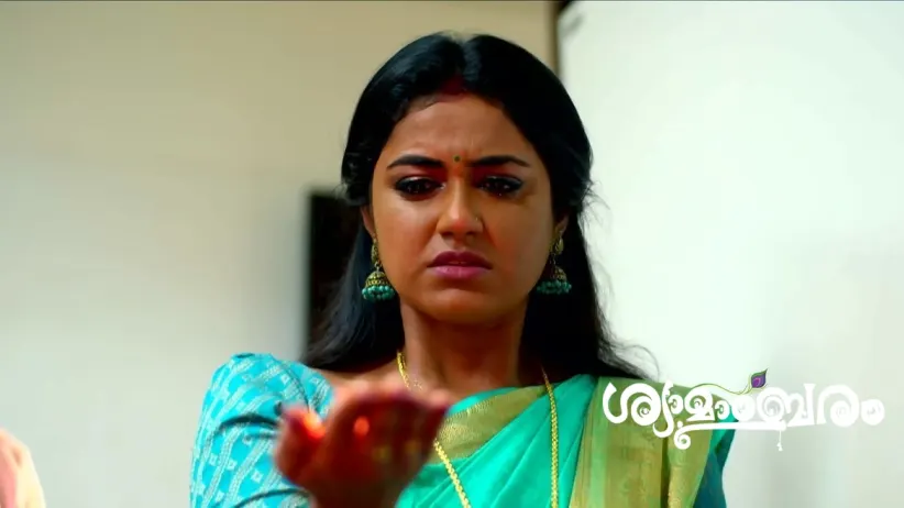 Shyama Burns Camphor on Her Palm