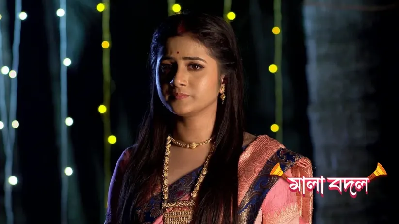 Diti Collects Lotus for the Sandhi Puja
