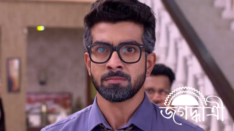 Durga Enters the Mukherjee House in a Wheelchair