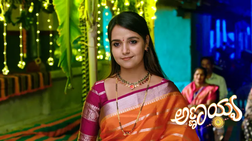 Shivanna Applies Mehendi to Parvathi's Palm