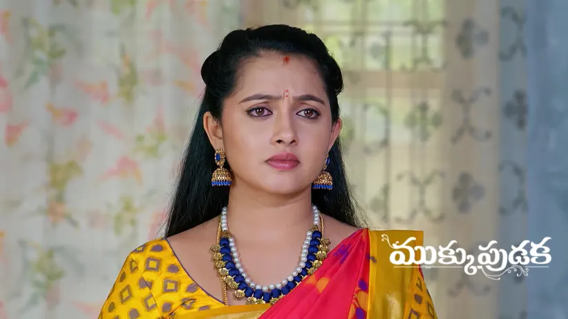 Archana Lifts the Goddess' Idol