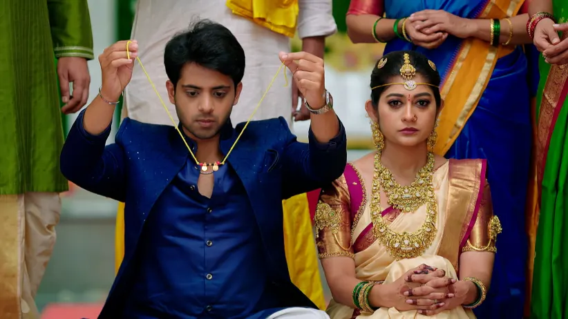 Three Knots Fall Around Lakshmi's Neck