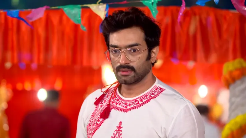 Apu and Arya Pour Water on Shivling Together