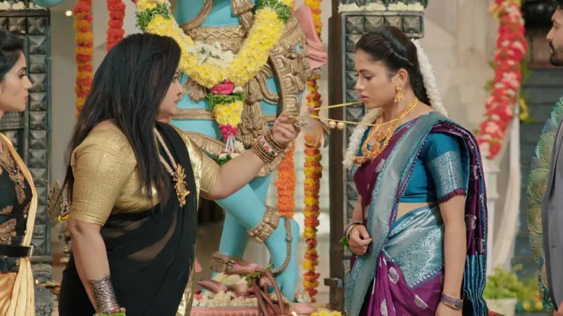 Rahul and Saraswati Perform a Puja