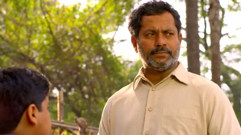 People sit in protest outside Ramji?s house