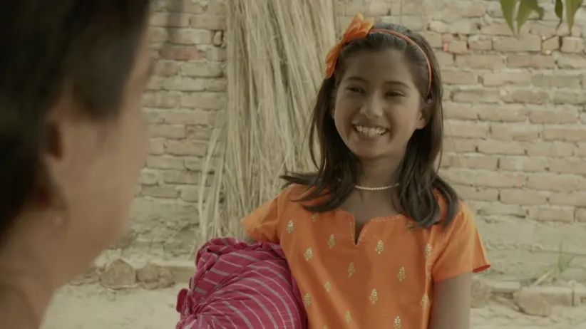 Ganga stitches a saree for Saraswati - Chati Ghate Ganga