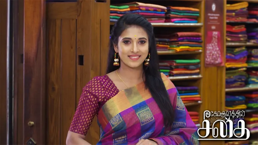 Arjun selects a sari for Iniya - Gokulathil Seethai